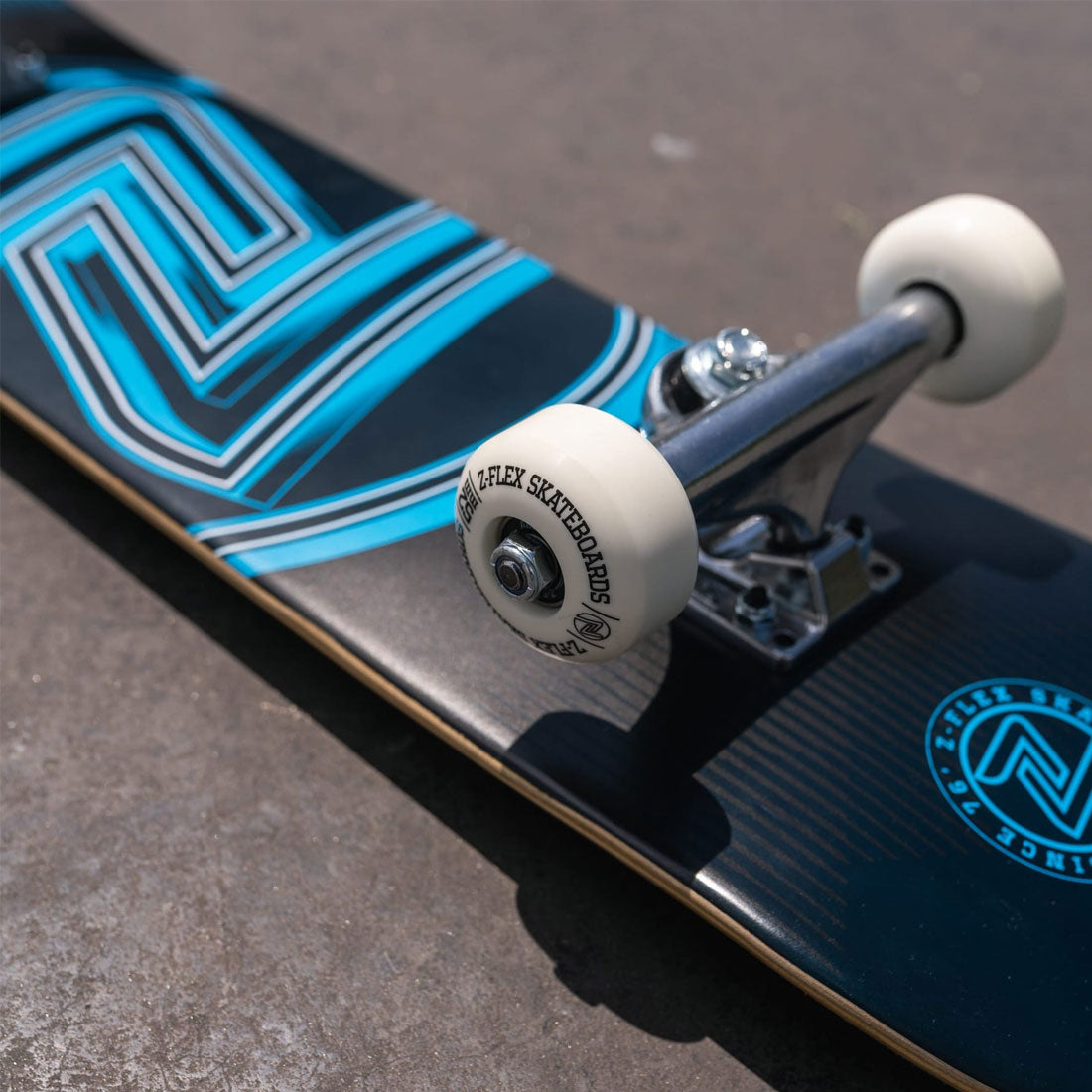 Z-Flex Logo 7.25 Mini Complete - Blue Skateboard Completes Modern Street